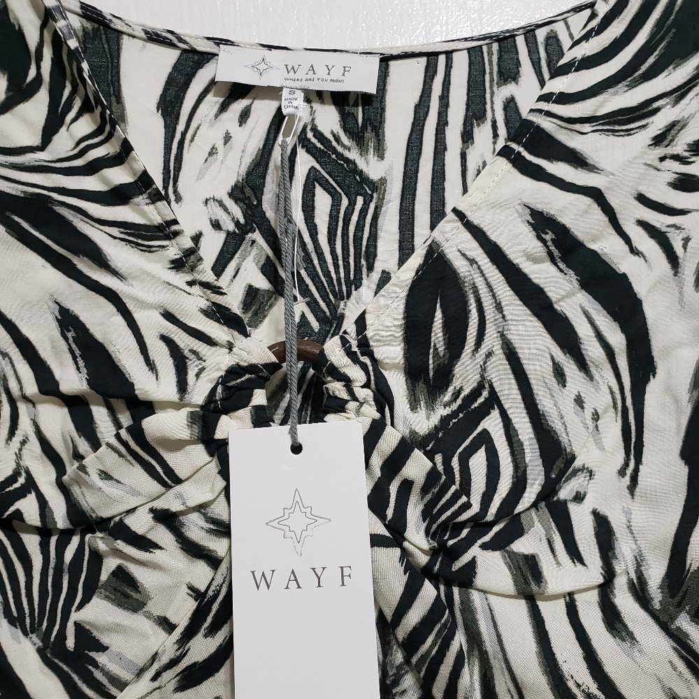 Blusa blanca y negra